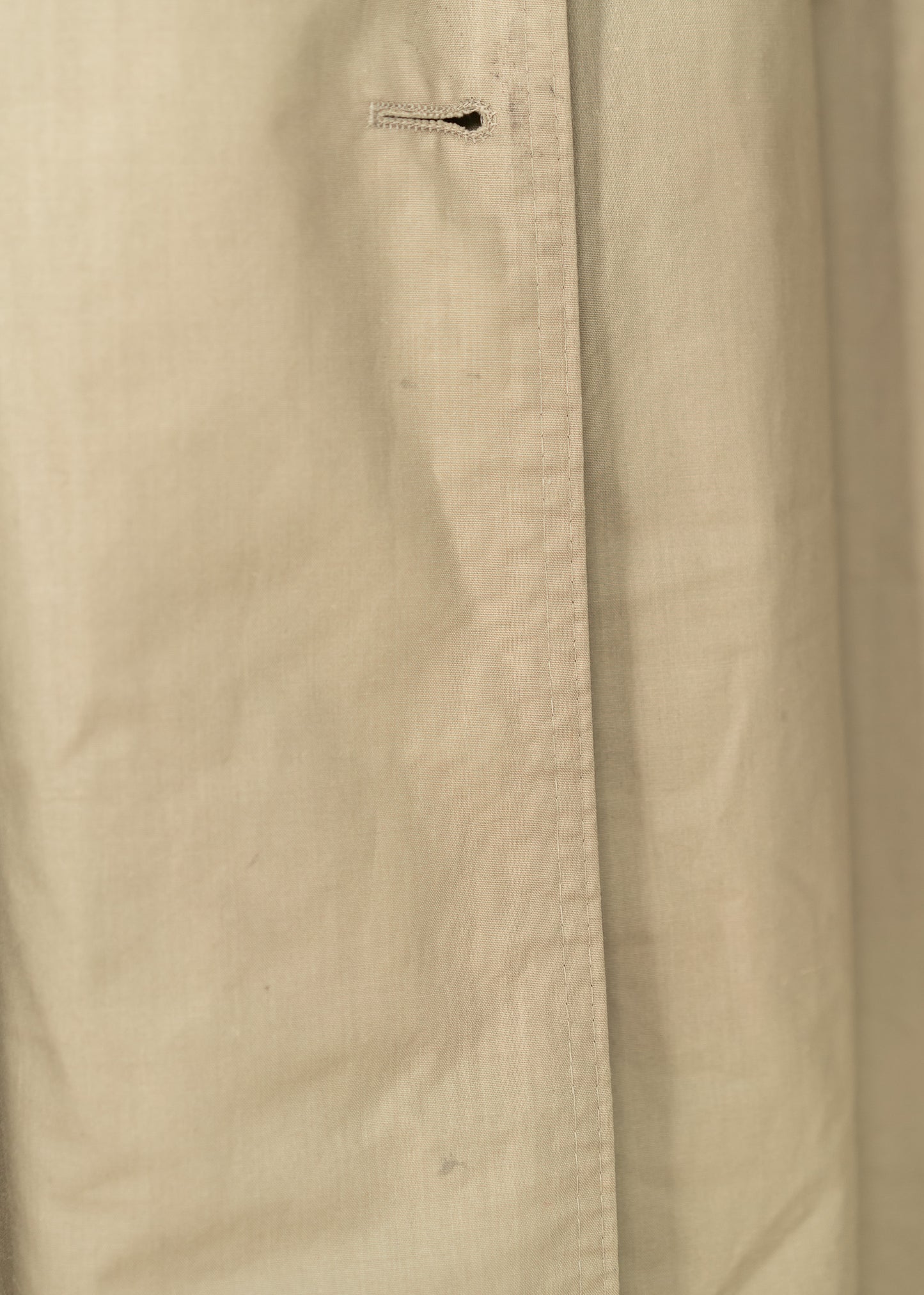 close up of a beige trench coat
