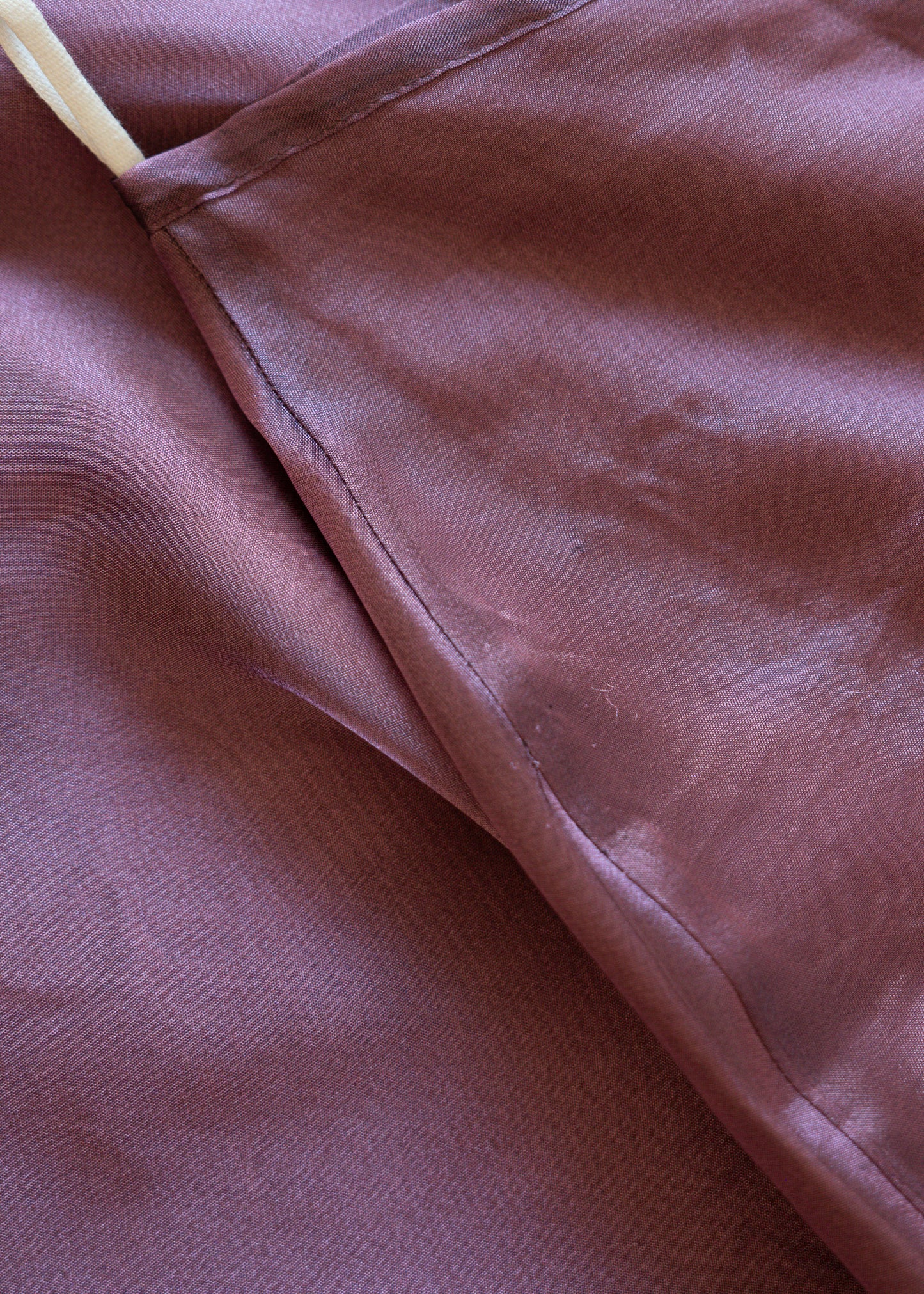Close-up of a textured mauve purple fabric
