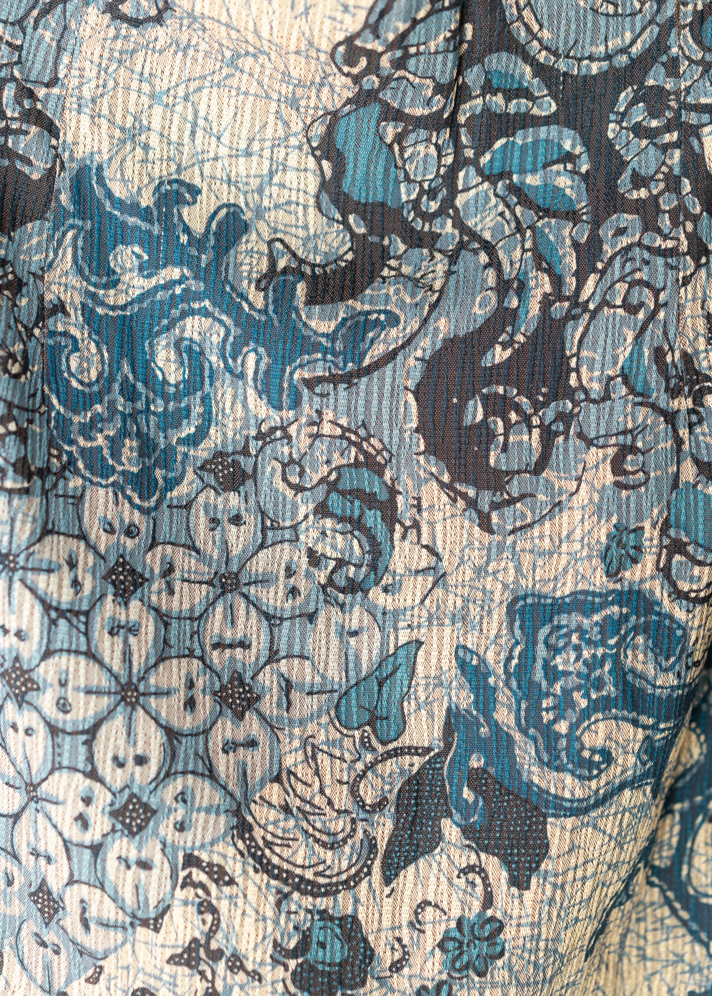 close up detail of a blue pattern skirt