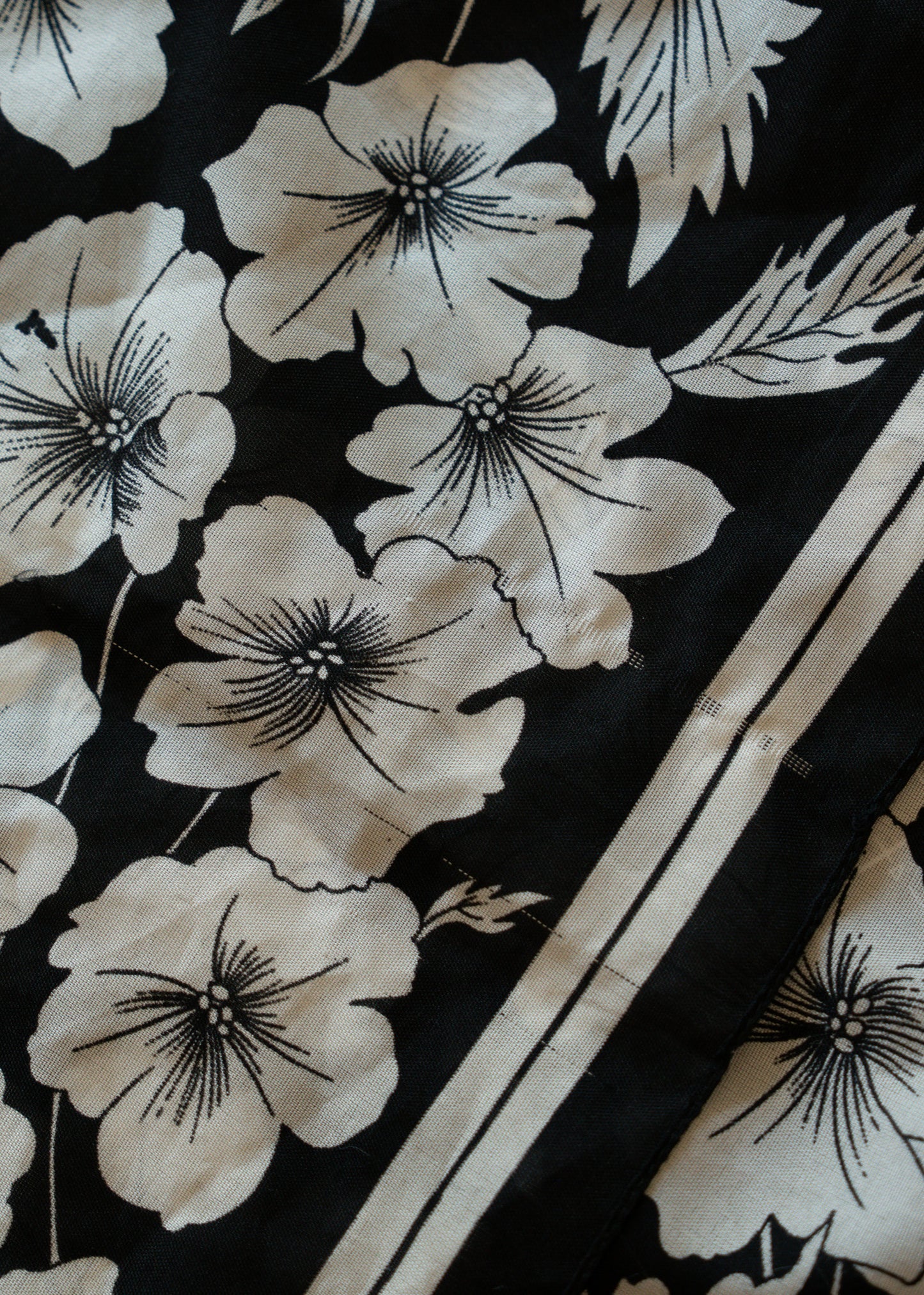 Black and white floral pattern with stripes on fabric